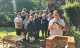 Oare Primary School Year 6 pupils place their time capsule of memories in the stone wall