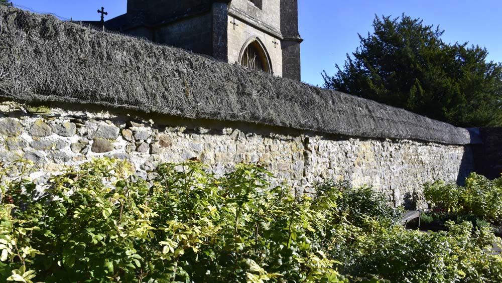 Avebury Manor garden-church thatched wall (Photo: ©National Trust/Abby George)