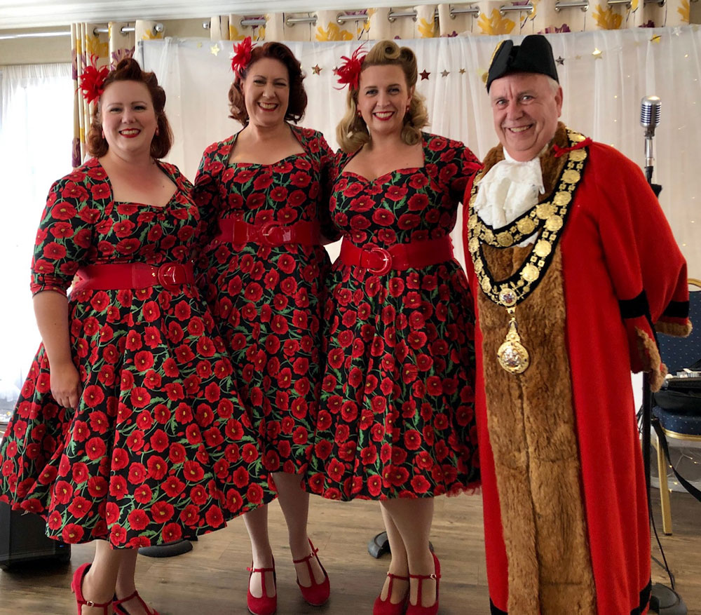 Mayor Mervyn Hall with 'Champagne at the Blitz' trio