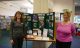 Louise Oliver and Alison West, Marlborough Library Assistants in front of the Marlborough Library History display