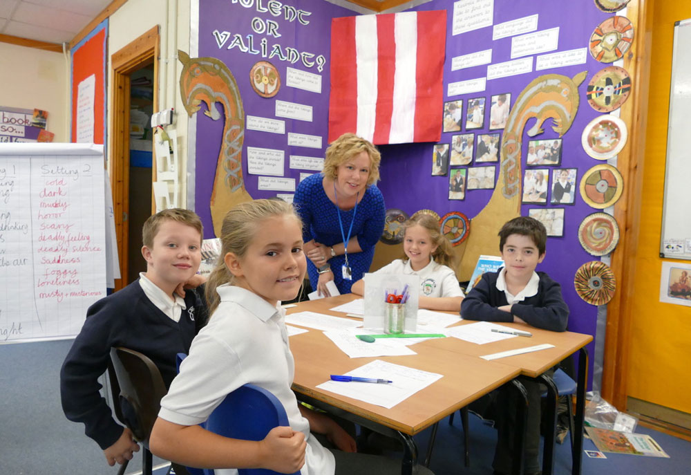 Principal of Burbage Primary School, Zoe Garbutt with Year 5 pupils