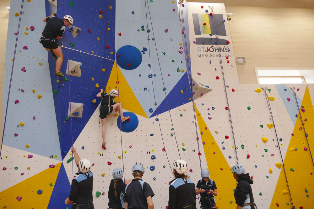 And they're off tackling the many different routes on offer on the climbing wall
