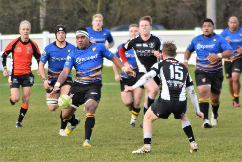 Viliame Waqanidrola (Quila) looking to kick over the RWB defence