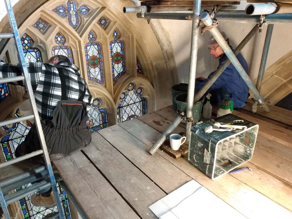 Working from the scaffolding: Howard Chivers & Peter Martindale cleaning stonework