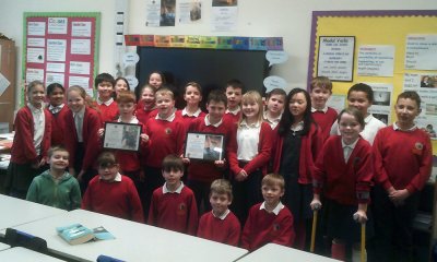 Marlborough St Mary's Otter Class with their certificates acknowledging their fundraising efforts