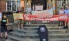 XR extinction rebelleion protestors on the steps of the Town Hall