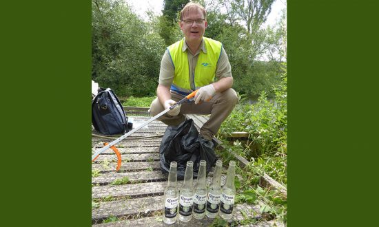Five Corona bottles sitting on a plank...Stonebridge, ARK