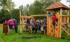 Mayor Mark Cooper cuts the ceremonial ribbon to declare Manton's new Play Area formally open