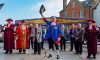 Town Cryer Mike Tupman leads the 'God Save The Queen' as the 2021 Mop Fair is declared open