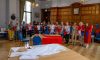 Marlborough's band of volunteer Jubilee 'Buntingeers' in the Town Hall, displaying the first long line of Marlborough Jubilee Bunting