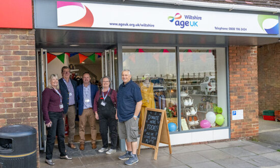 The new Age UK Wiltshire shop / Information & Advice Hub in the High Street - now open, with (l-r) Sarah Cardy (CEO), Richard Purchase (Trustee), Oliver Moody (Commercial Manager), Samantha Baker (Manager) and John Adcock